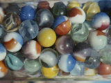 Close View of Colorful Glass Marbles in a Jar