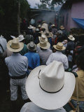 A Gathering of Guatemalan Men in Cowboy-Style Hats