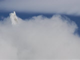 The Summit of Cerro Torre Massif Rises Above the Clouds