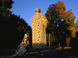 A Woman Wears a Fake Fur Coat Patterned Like Her Pet Dalmation