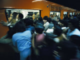 Buy Commuters Cram into a Subway Car at AllPosters.com