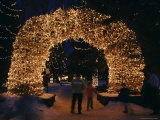 An Arch Built of Antlers is Covered in Lights at the Town Square