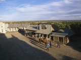 Well-Armed Cowboys Stride the Street of This Western Movie Location Photographic Print