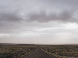 An Empty Road Stretches Toward the Horizon in New Mexico