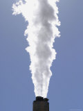 A Power Plant Smokestack Emits Steam