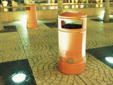Orange Trash Cans on a Tiled Pavement in Kowloon, Hong Kong