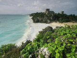 Waves Crash on a Beach Below El Castillo