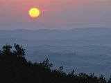 Sunrise over Ridges and Hills in the Tuscan Countryside