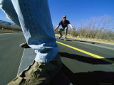 Buy Jim Hall and Mark Youngquist Skateboard down a Paved Road at AllPosters.com