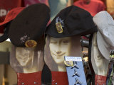 Buy Display of Hats Perch on Cardboard Faces of the Mona Lisa at AllPosters.com