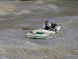 Man Braving the Hermit Rapids in a Nevills Boat