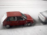 Buy Winter Storm Freezes Ice on the Road, Trapping a Parked Car at AllPosters.com