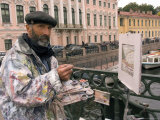 Buy An Artist Paints a Street Scene at AllPosters.com