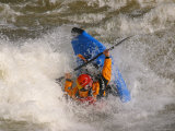 A Whitewater Kayaker Getting Vertical Doing Rodeo Moves