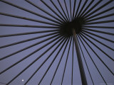 Buy Twilight View Through Spoked Object with Moon in View at AllPosters.com