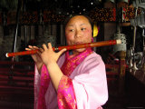 The Musician is Playing a Chinese Flute at the Temple of Eternal