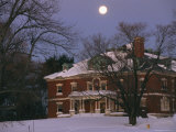 Buy A Full Moon Rises Over a Snow-Covered Mclean Hospital Building at AllPosters.com