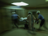 Buy Emergency Medical Staff Rush in a Patient, Maryland Institute for Emergency Medicine at AllPosters.com