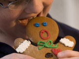 A Gingerbread Man Reacts to Being Eaten by a Young Male