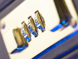 Combination of a Locked Briefcase