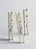 Three Old-Fashioned Wooden Clothes Pegs