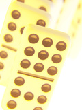 Line of Black and White Dominoes Against White Background