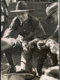 Cheerful Australian Soldier Peeling a Potato