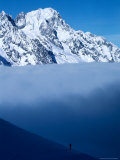 Buy Lone Skier Looking Up at Cloud Bank, Italy at AllPosters.com