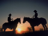 Silhouetted Cowboys