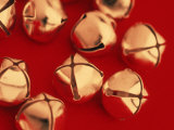 Christmas Brass Bells with Red Background Photographic Print