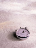 Stopwatch on Light Textured Background