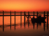 Buy Silhouette of Boat at Sunset, FL at AllPosters.com