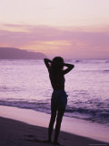 Buy Woman Standing on Beach in Silhouette at AllPosters.com