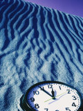Clock Reading 11:55 Pm in the Sand