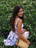 Buy Young Woman Sitting Outside at AllPosters.com