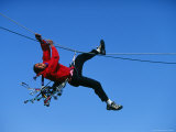 Buy Rock Climber Hanging off Rope at AllPosters.com