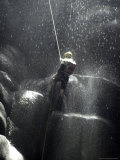 Climber Showered with Water in Cave, Mexico