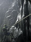 Climbers on Rock in Wet Cave, Mexico