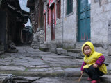 Child Playing on the Street, China