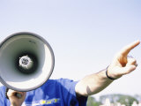 Person Talking into a Bullhorn