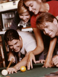 Two Young Couples Playing Pool