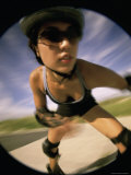Close-up of a Young Woman Inline Skating