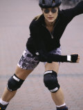 Woman Skating in Safety Gear