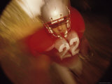 High Angle View of an American Football Player Running with the Ball