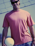 Buy Young Man Standing Behind a Volleyball Net at AllPosters.com