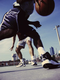 Low Angle View of Two Men Playing Basketball