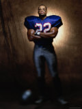 Portrait of an American Football Player Standing with His Arms Folded