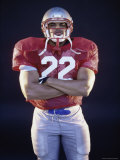 Portrait of an American Football Player Standing with His Arms Folded