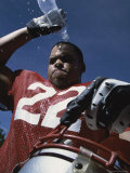 Low Angle View of an American Football Player Pouring Water on His Head