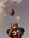 Low Angle View of an American Football Player Catching a Ball
